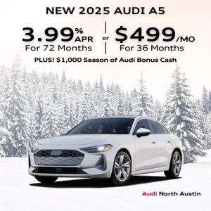 Side view of an Audi A5 parked.